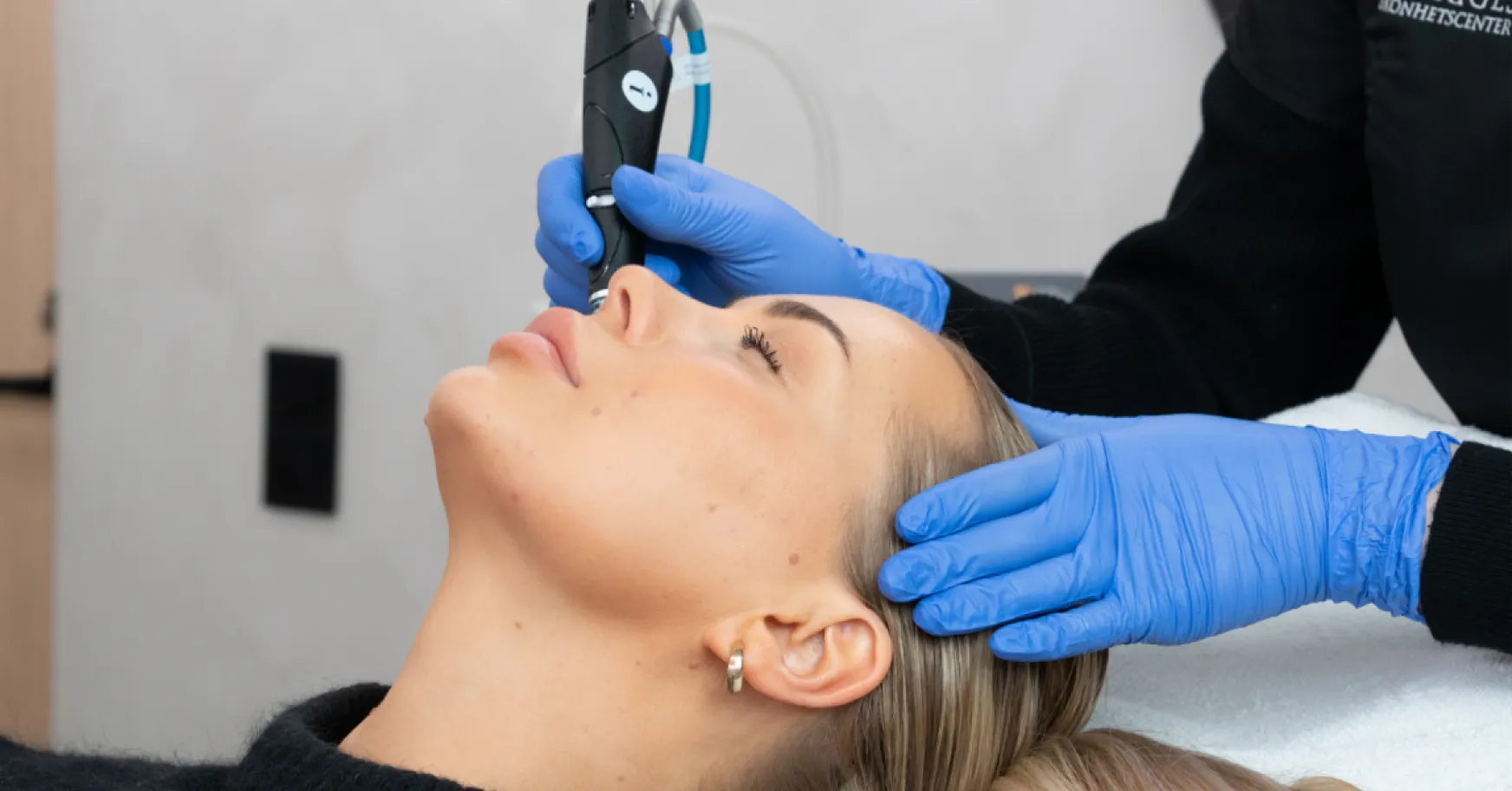 Processen för Microdermabrasion